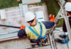 Bauarbeiter auf Baustelle Gerüst